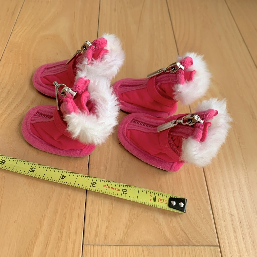 Small pink booties for dogs